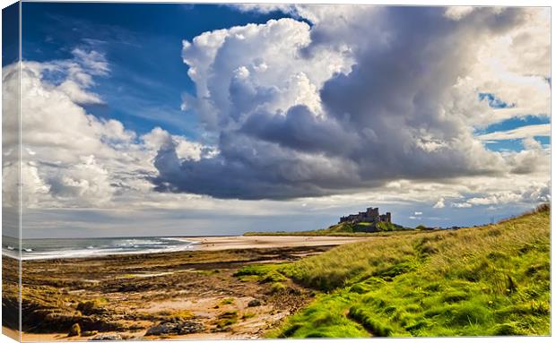 Bamburgh Beach and Castle Canvas Print by Kevin Tate
