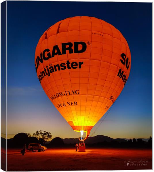 Red Hot Air Balloon with Blue Hour Background. Canvas Print by Maggie Bajada