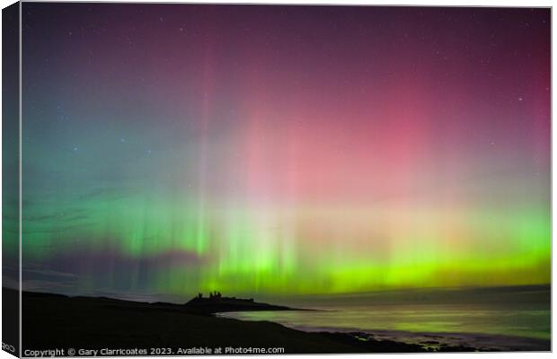 Northern Lights at Dunstanburgh Castle Canvas Print by Gary Clarricoates
