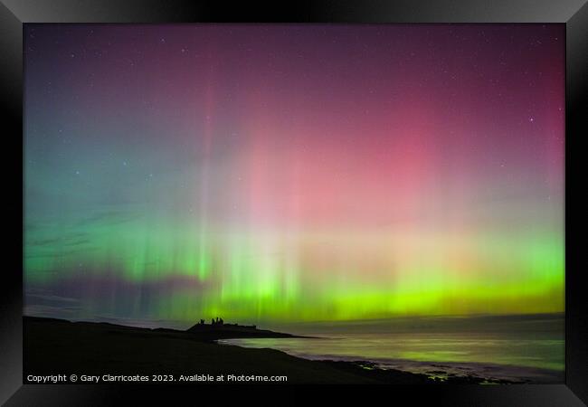 Northern Lights at Dunstanburgh Castle Framed Print by Gary Clarricoates
