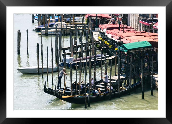 A view of the Grand Canal featuring a Gondola Framed Mounted Print by Sean Tobin