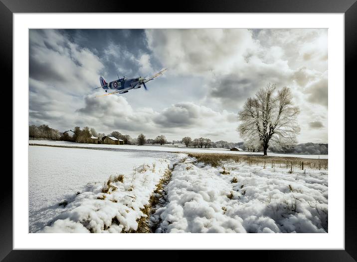 Spitfire Snowbound Framed Mounted Print by J Biggadike