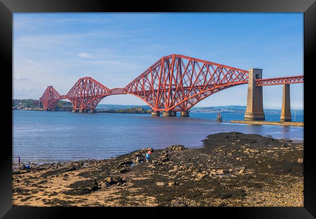 Forth Bridge From Queensferry Shore In Scotland Framed Print by Artur Bogacki