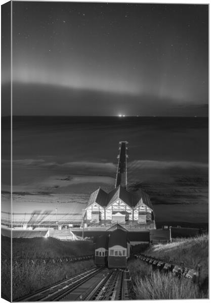 Aurora Borealis over Saltburn pier in Black and white Canvas Print by Kevin Winter