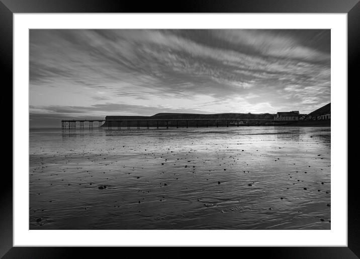 sunrise over Saltburn beach in Black and white Framed Mounted Print by Kevin Winter