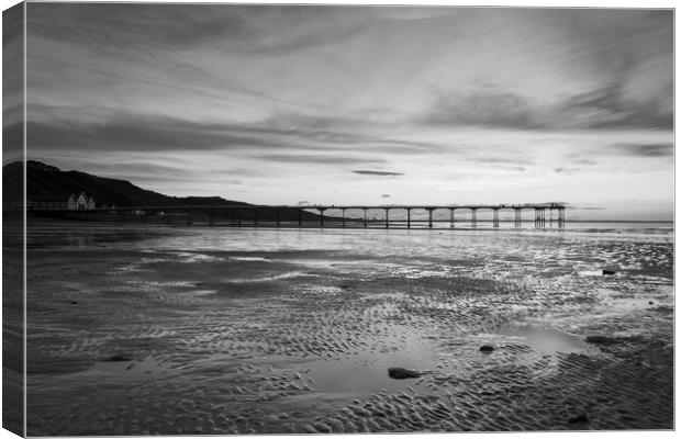 Sunset over Saltburn beach in Black and white Canvas Print by Kevin Winter