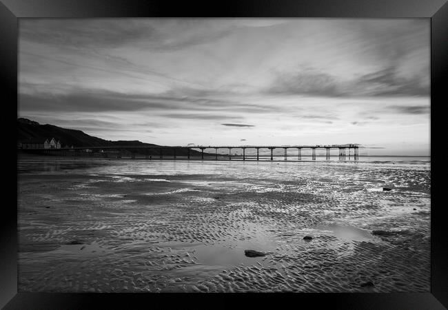 Sunset over Saltburn beach in Black and white Framed Print by Kevin Winter