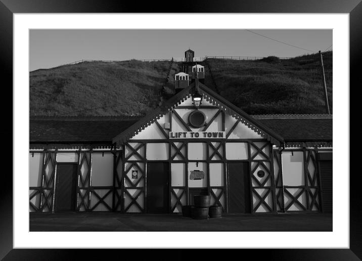 Saltburn cliff lift in black and white Framed Mounted Print by Kevin Winter
