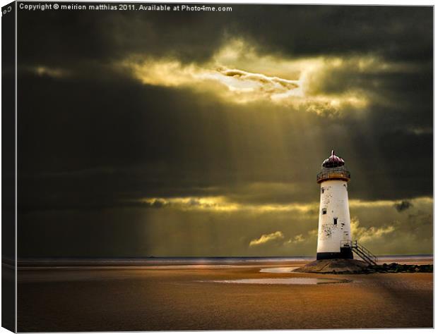 talacre lighthouse with sunbeams Canvas Print by meirion matthias