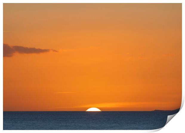 The sun setting over the horizon with an orangey in the sky Print by Rory Hailes