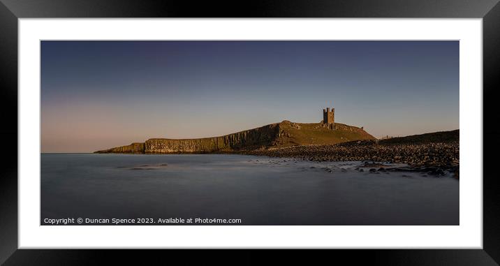 Dunstanburgh Castle at sunset Framed Mounted Print by Duncan Spence