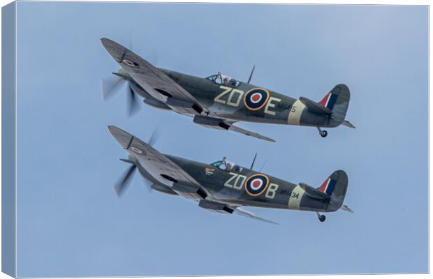Spitfires MH415 and MH434 Canvas Print by J Biggadike