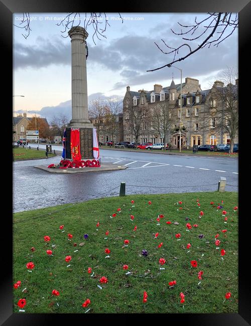 Remembrance Sunday poppies and wreaths - Grantown on Spey  Framed Print by Phil Banks
