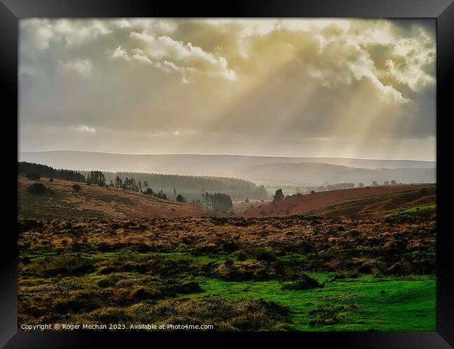 Autumn rays over Dartmoor. Framed Print by Roger Mechan