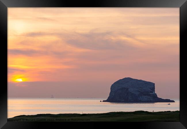 Sunrise over Bass Rock Framed Print by Richard Newton