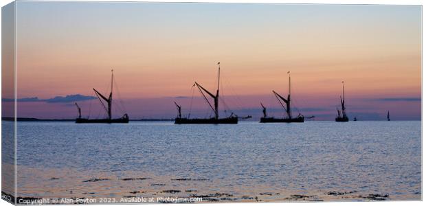 Pre dawn Thames sailing barges at anchor Canvas Print by Alan Payton