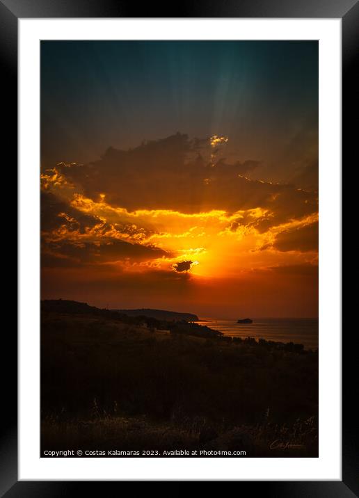 Sunrise behind the clouds Framed Mounted Print by Costas Kalamaras