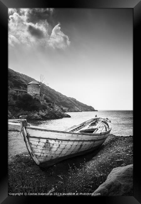 Abandoned Boat by the Greek Seaside Framed Print by Costas Kalamaras