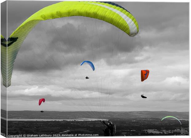 Paragliders Canvas Print by Graham Lathbury