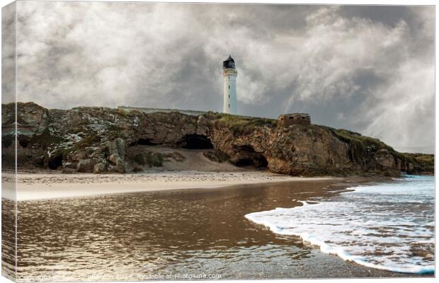 Lossiemouth lighthouse and Covesea caves Canvas Print by Tom McPherson