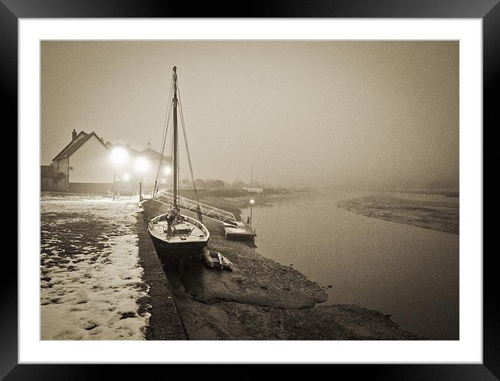 Boat at quay in fog Framed Mounted Print by Gary Eason