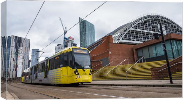 Yellow tram passing the Manchester Central Convention Complex Canvas Print by Jason Wells