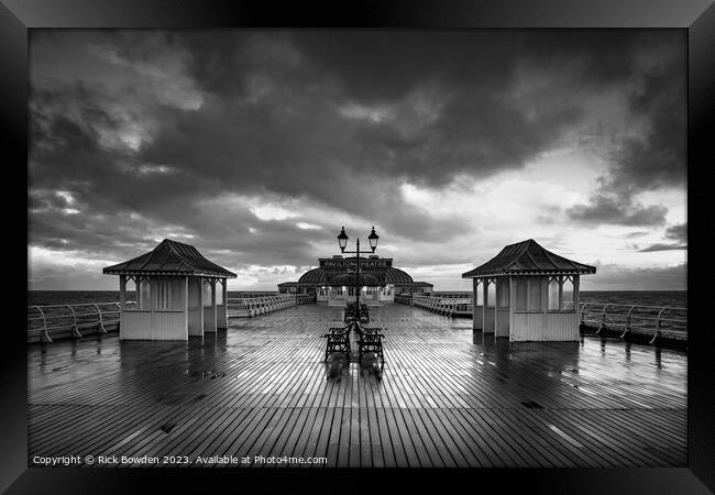Pier after the Rain Framed Print by Rick Bowden