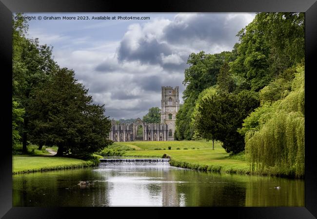 Fountains Abbey river and weir Framed Print by Graham Moore