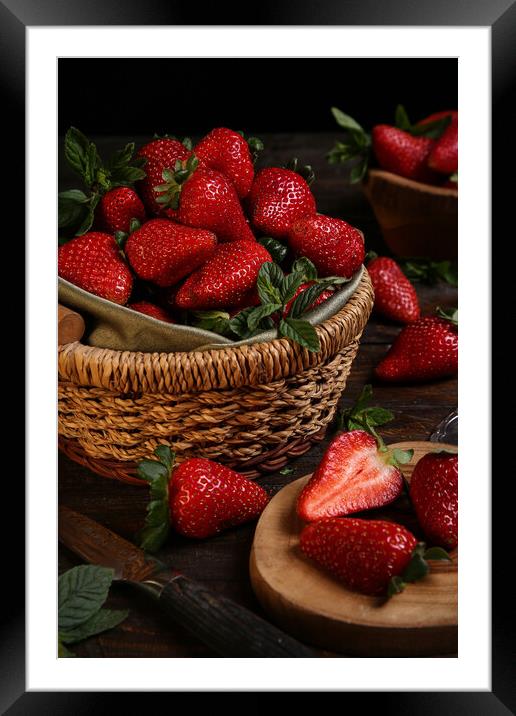 Fresh strawberries in a basket  Framed Mounted Print by Olga Peddi