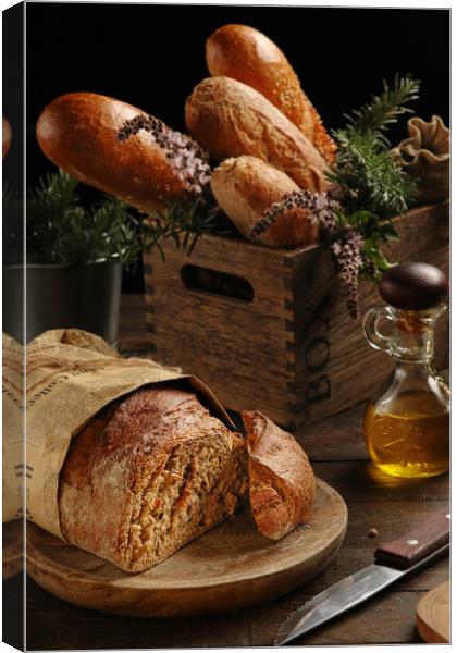 Rustic handmade bread  Canvas Print by Olga Peddi