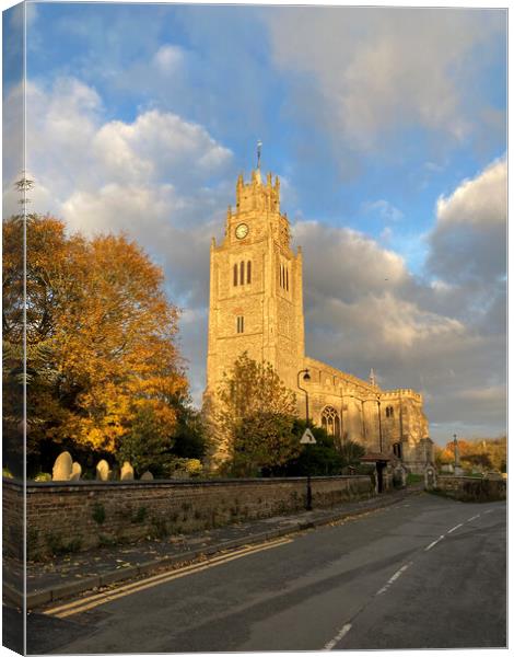 Sutton church in late afternoon sunshine Canvas Print by Andrew Sharpe