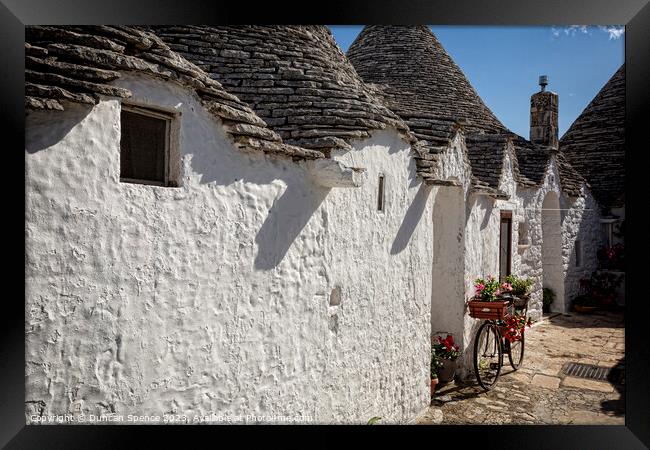 Trulli Houses Framed Print by Duncan Spence