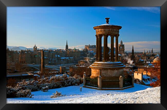 Snow on Calton Hill and city of Edinburgh, Scotlan Framed Print by Arch White
