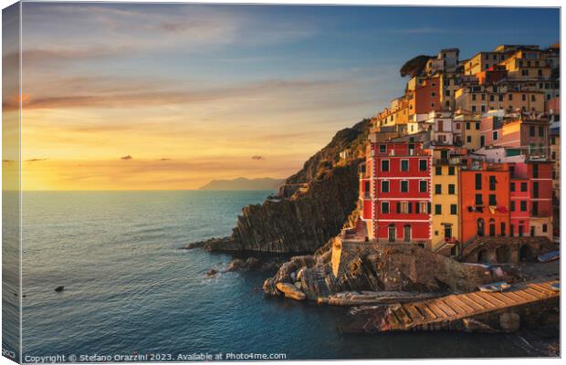 Wonderful sunset over Riomaggiore fishing village. Cinque Terre Canvas Print by Stefano Orazzini