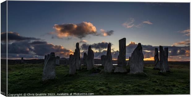 Calanais Standing Stones at sunset Canvas Print by Chris Drabble
