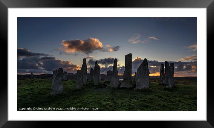 Calanais Standing Stones at sunset Framed Mounted Print by Chris Drabble