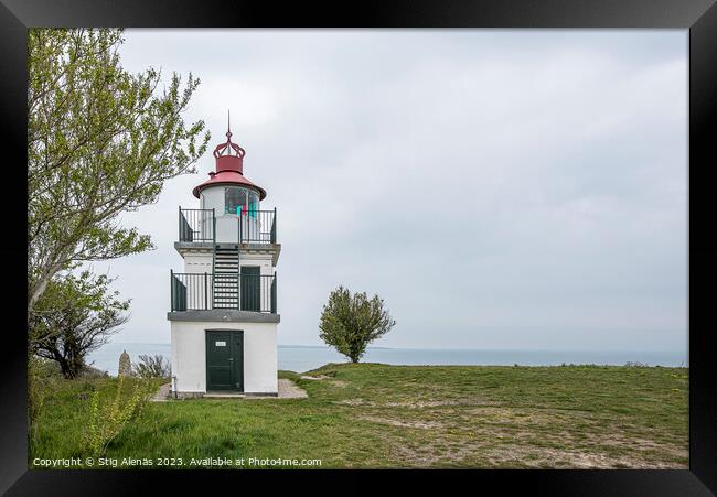 Spodsbjerg lighthouse overlooking a beach meadow and the sea  Framed Print by Stig Alenäs