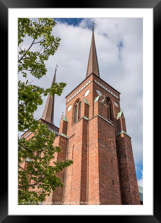 the red brick towers of Roskilde cathedral reach up in the sky Framed Mounted Print by Stig Alenäs