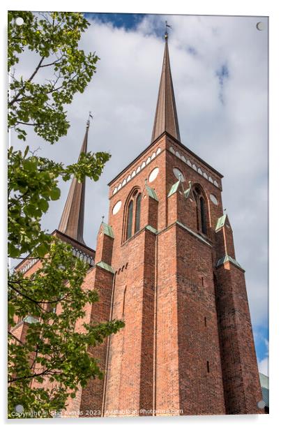 the red brick towers of Roskilde cathedral reach up in the sky Acrylic by Stig Alenäs