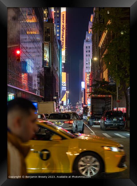 Taxi In NYC Framed Print by Benjamin Brewty