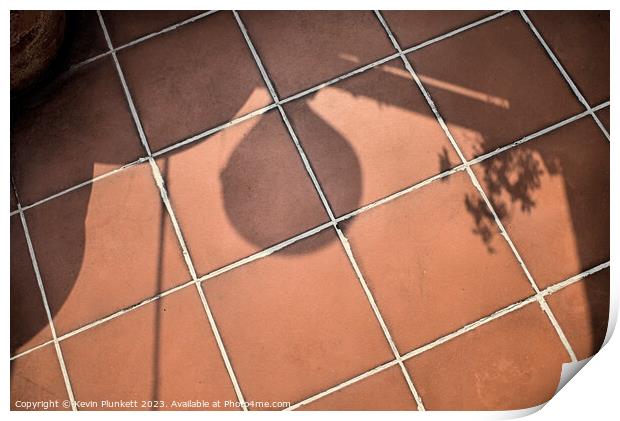 Shadows on floor tiles Print by Kevin Plunkett