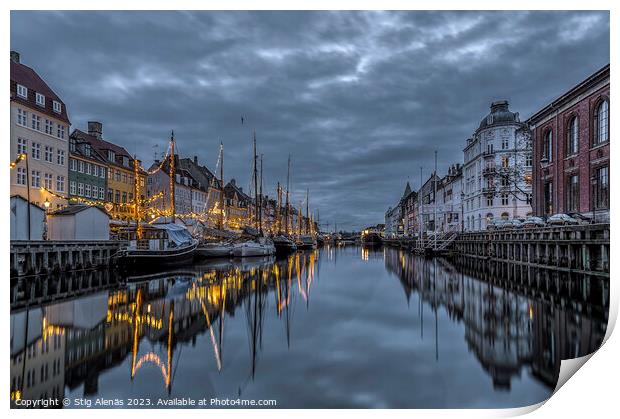 Christmas decorations in Nyhavn are reflected in the water durin Print by Stig Alenäs