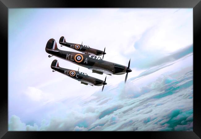 Spitfires Dive In The Blue Framed Print by J Biggadike