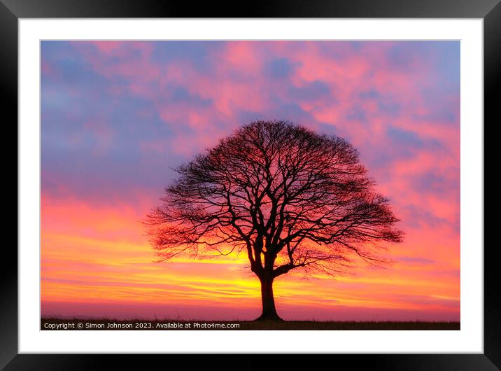 A sunset over a body of water Framed Mounted Print by Simon Johnson