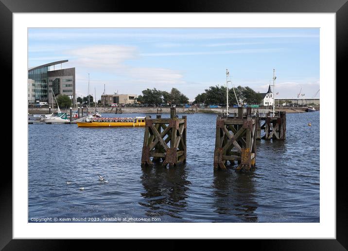 Cardiff bay wooden piers Framed Mounted Print by Kevin Round