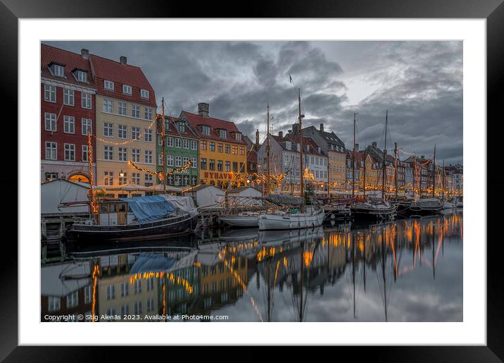 Fishing boats among glittering Christmas decorations in Copenhag Framed Mounted Print by Stig Alenäs