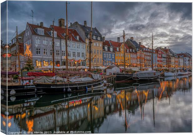 Christmas lights reflect in Copenhagen Nyhavn canal at dusk Canvas Print by Stig Alenäs
