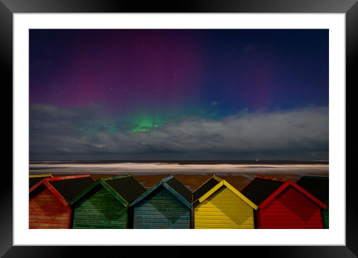 Aurora beach huts Framed Mounted Print by Kevin Winter