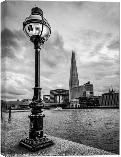Lamp and Shard Canvas Print by Roger Dutton