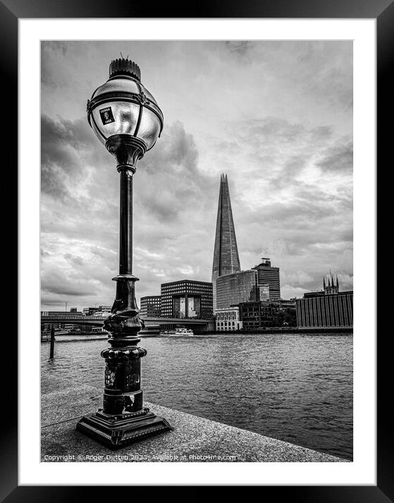 Lamp and Shard Framed Mounted Print by Roger Dutton